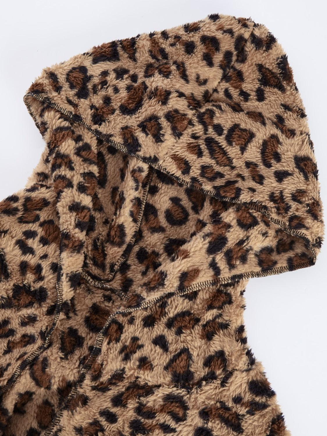 Fuzzy leopard long sleeve hooded jacket.