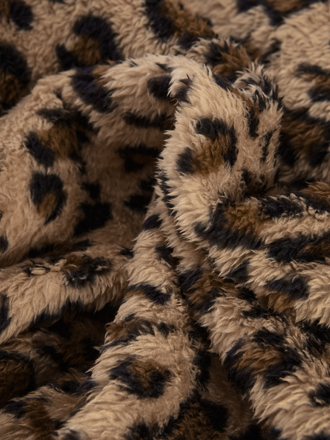 Fuzzy leopard long sleeve hooded jacket.