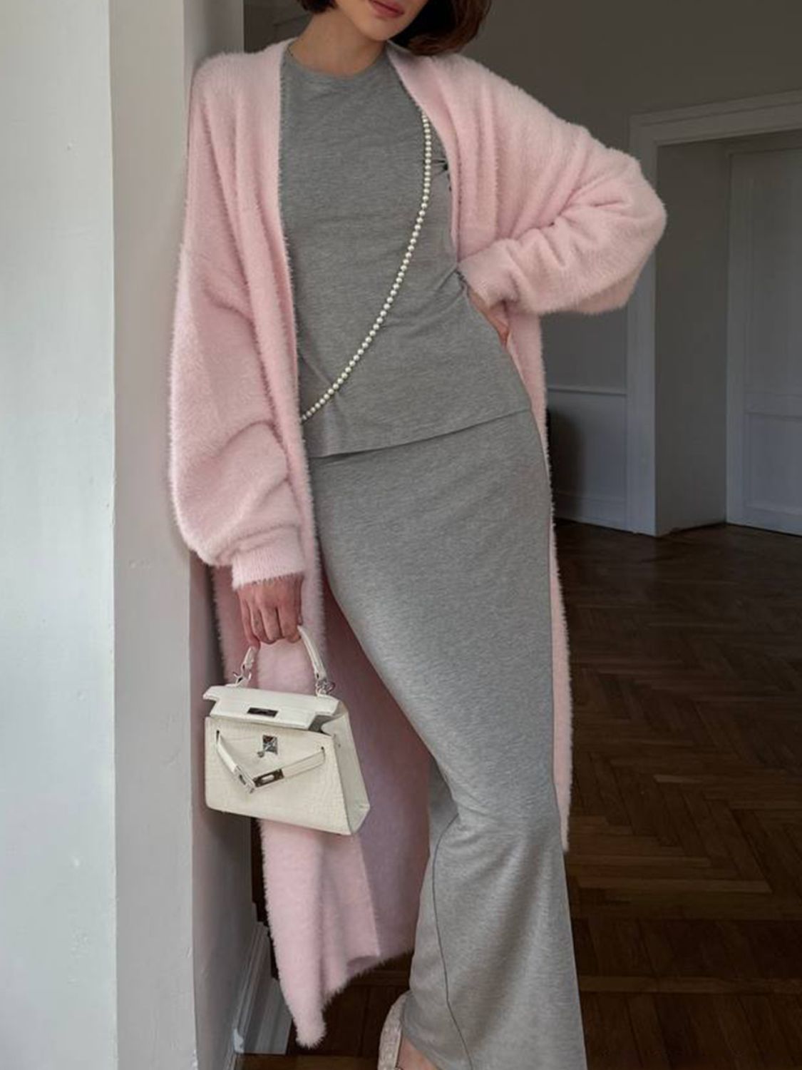Fuzzy open front solid color cardigan.