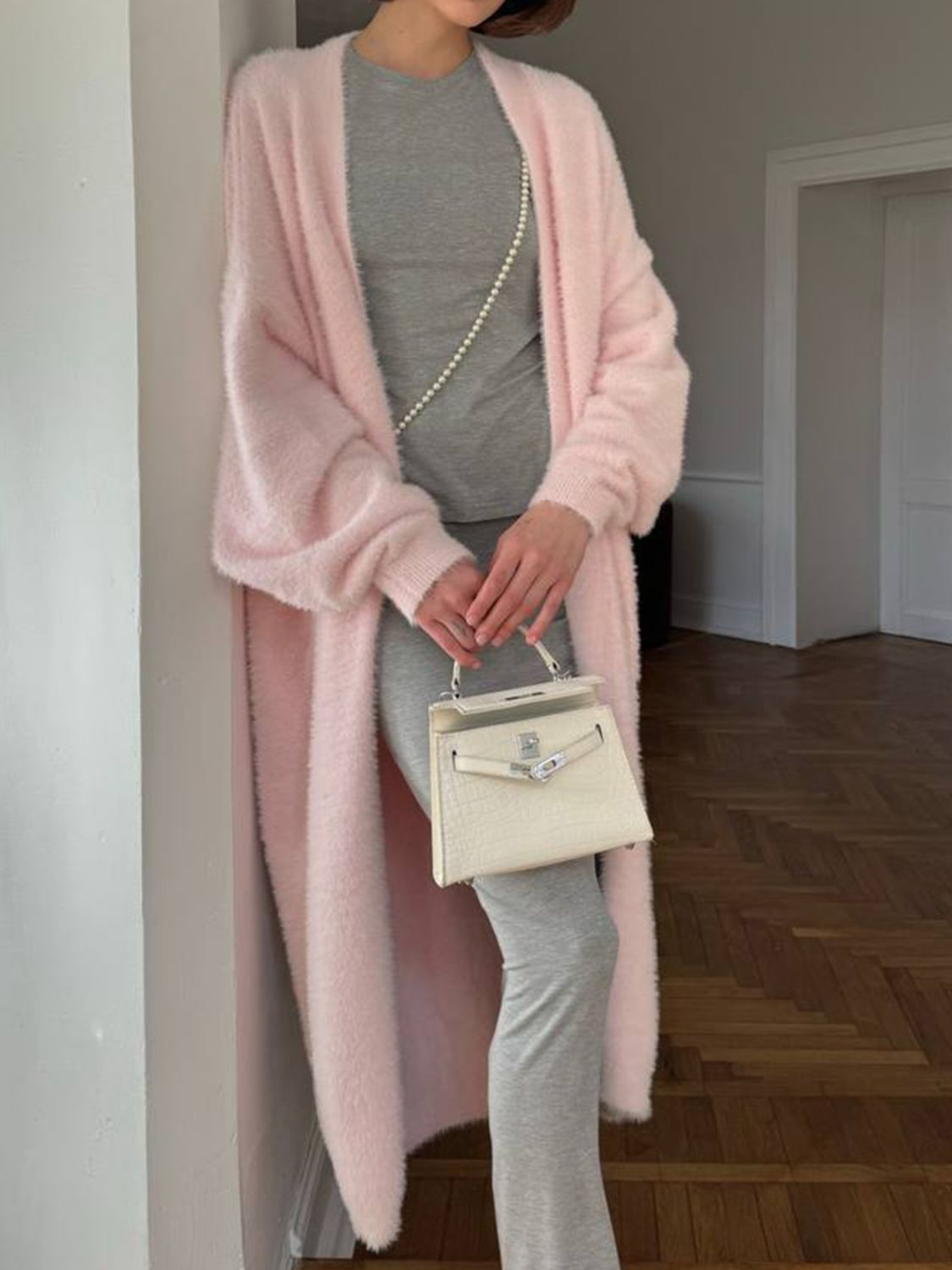 Fuzzy open front solid color cardigan.