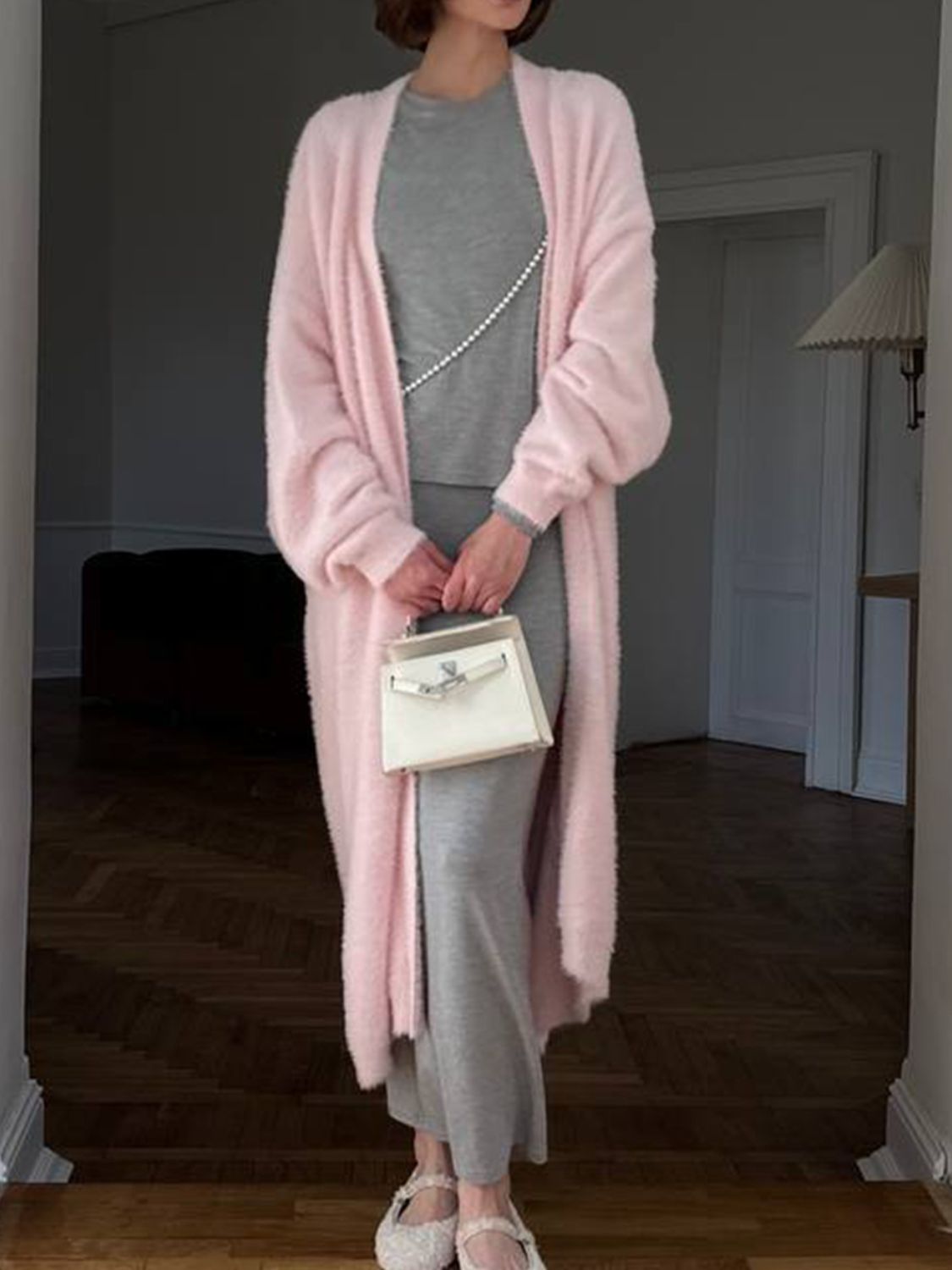 Fuzzy open front solid color cardigan.