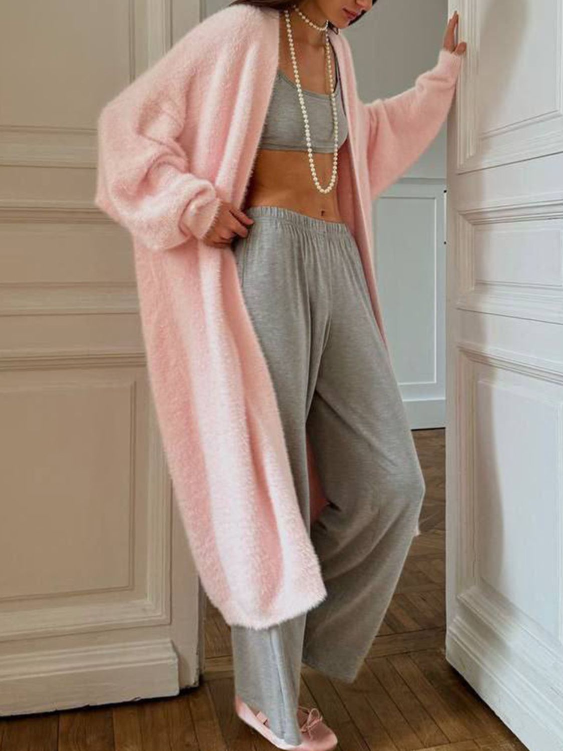 Fuzzy open front solid color cardigan.