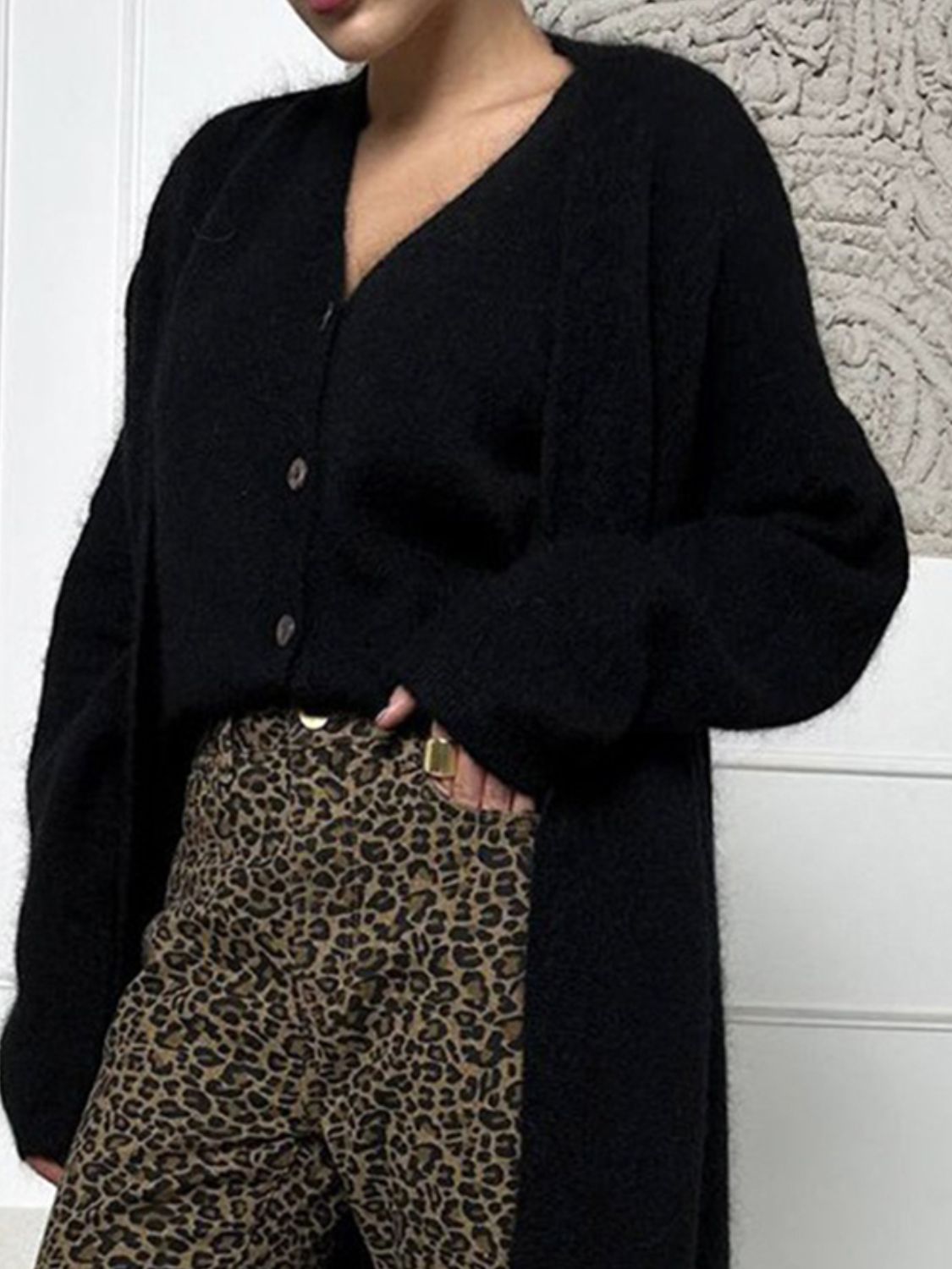 Fuzzy open front solid color cardigan.