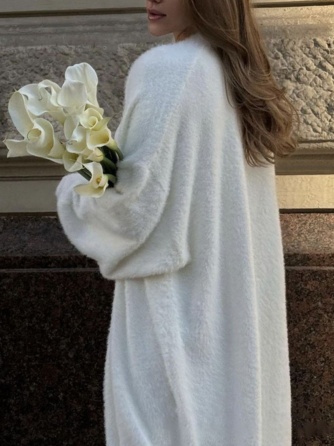 Fuzzy open front solid color cardigan.