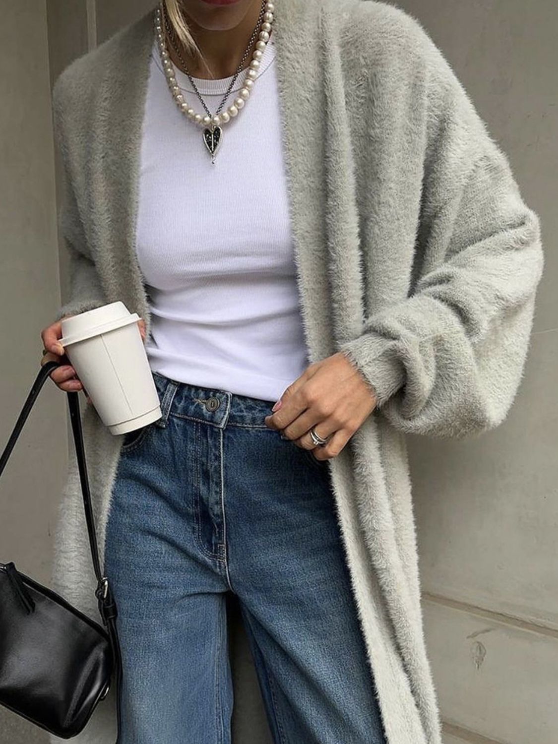 Fuzzy open front solid color cardigan.
