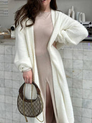 Fuzzy open front solid color cardigan.