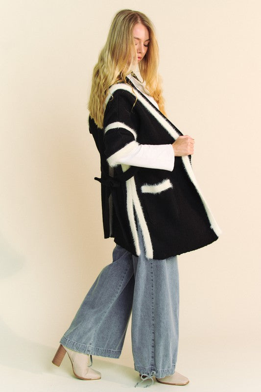 Fuzzy trim open front loose fit cardigan with tie and slit pockets.