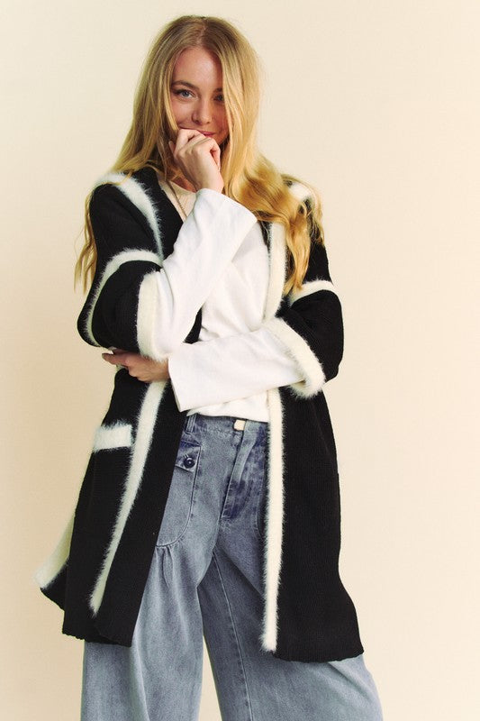 Fuzzy trim open front loose fit cardigan with tie and slit pockets.