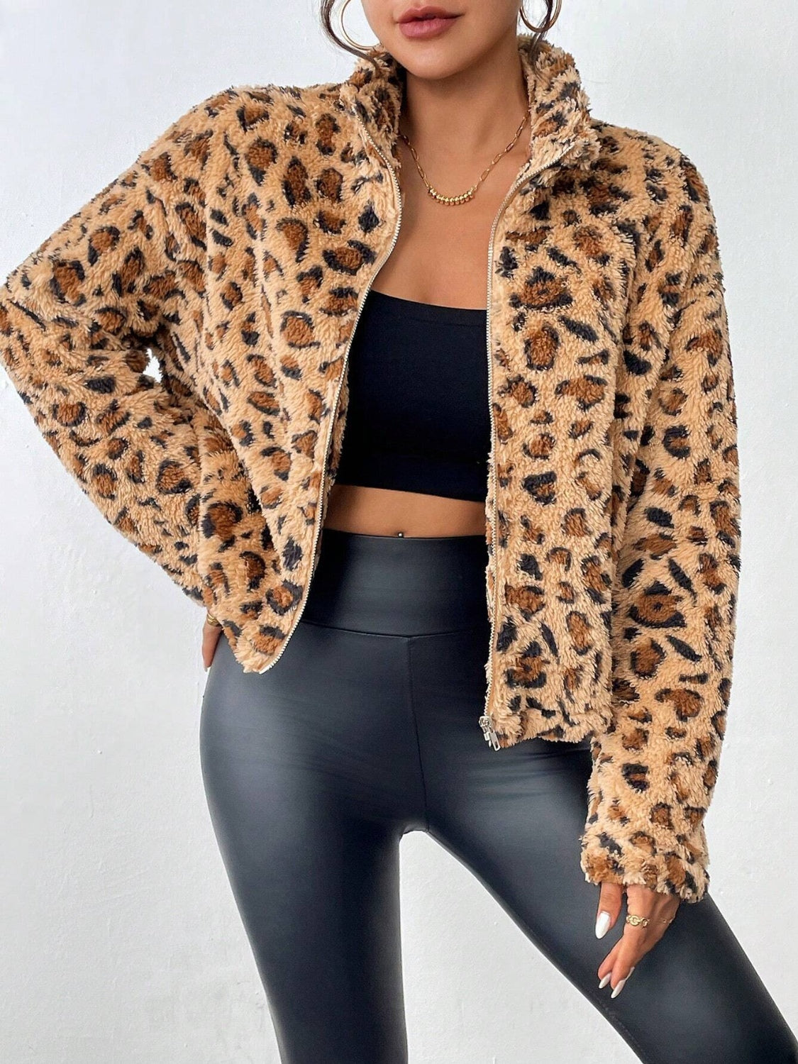 Fuzzy turtleneck leopard print zip up jacket.