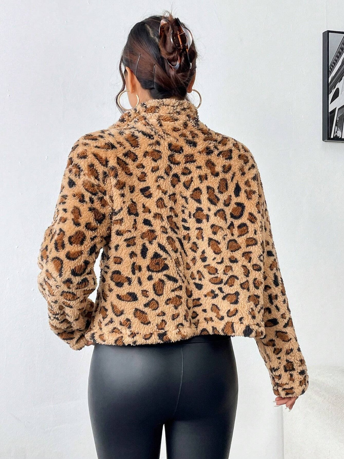 Fuzzy turtleneck leopard print zip up jacket.