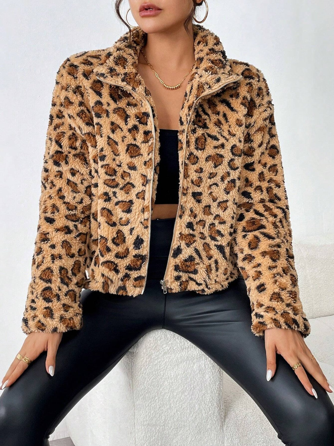 Fuzzy turtleneck leopard print zip up jacket.