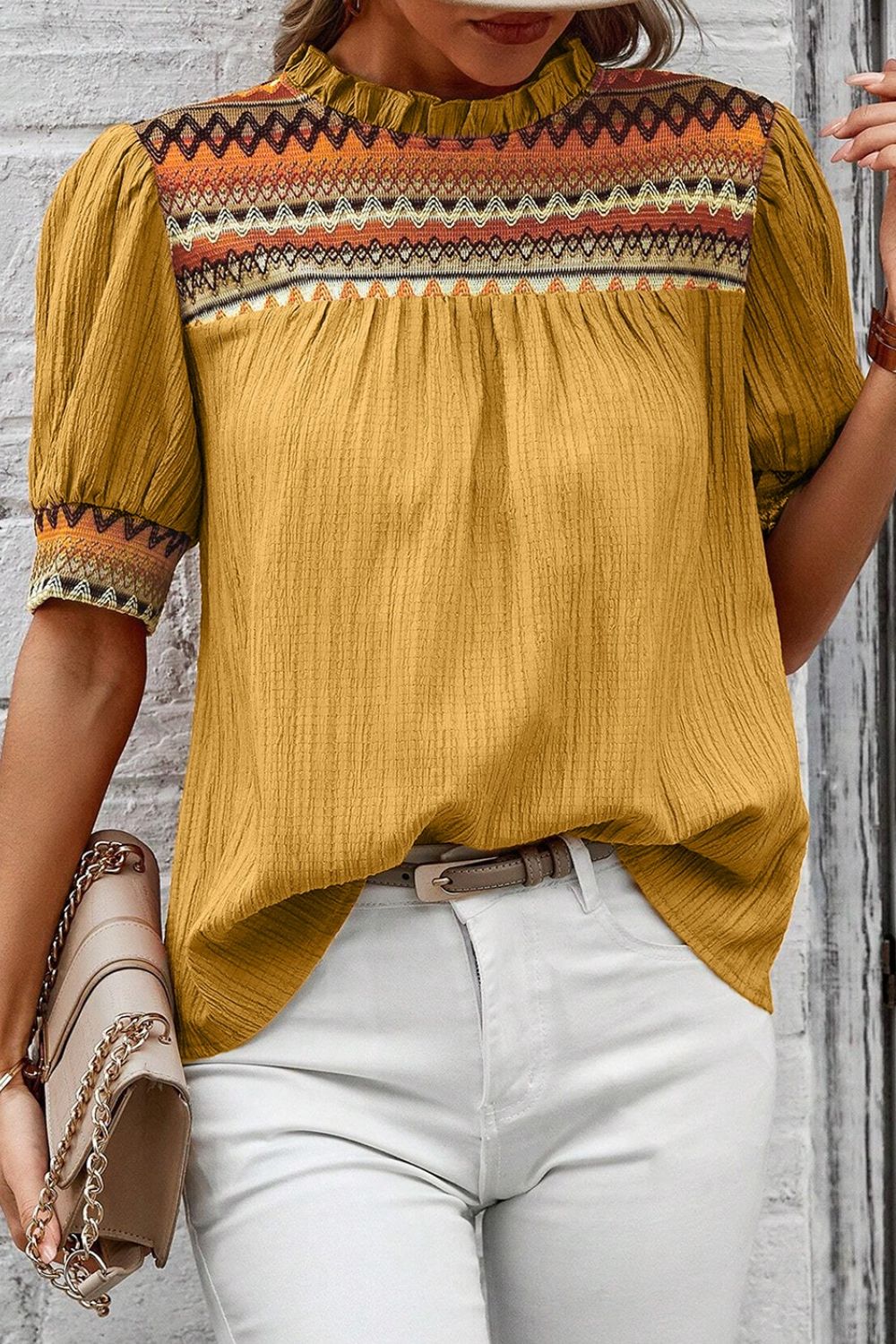 Geometric frill mock neck short sleeve blouse.