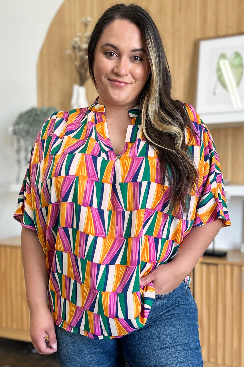 Double Take full size geometric notched dolman sleeve top.