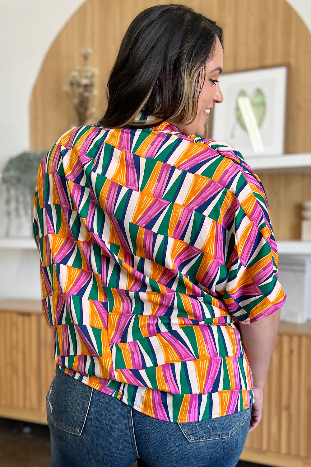 Double Take full size geometric notched dolman sleeve top.