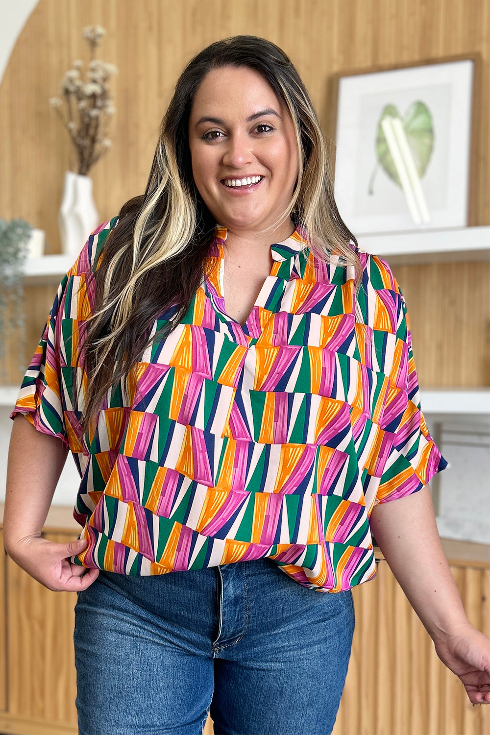 Double Take full size geometric notched dolman sleeve top.