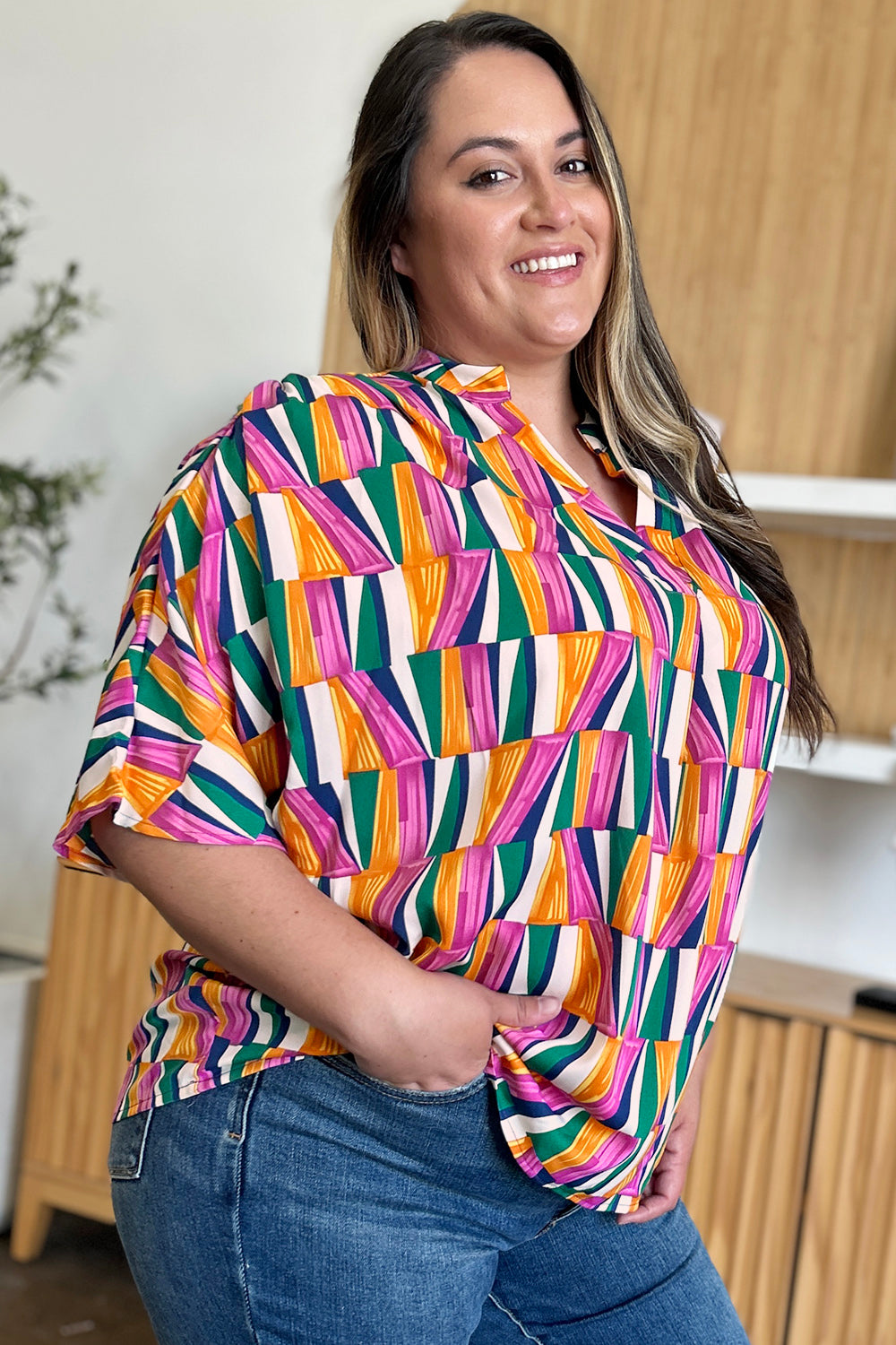 Double Take full size geometric notched dolman sleeve top.