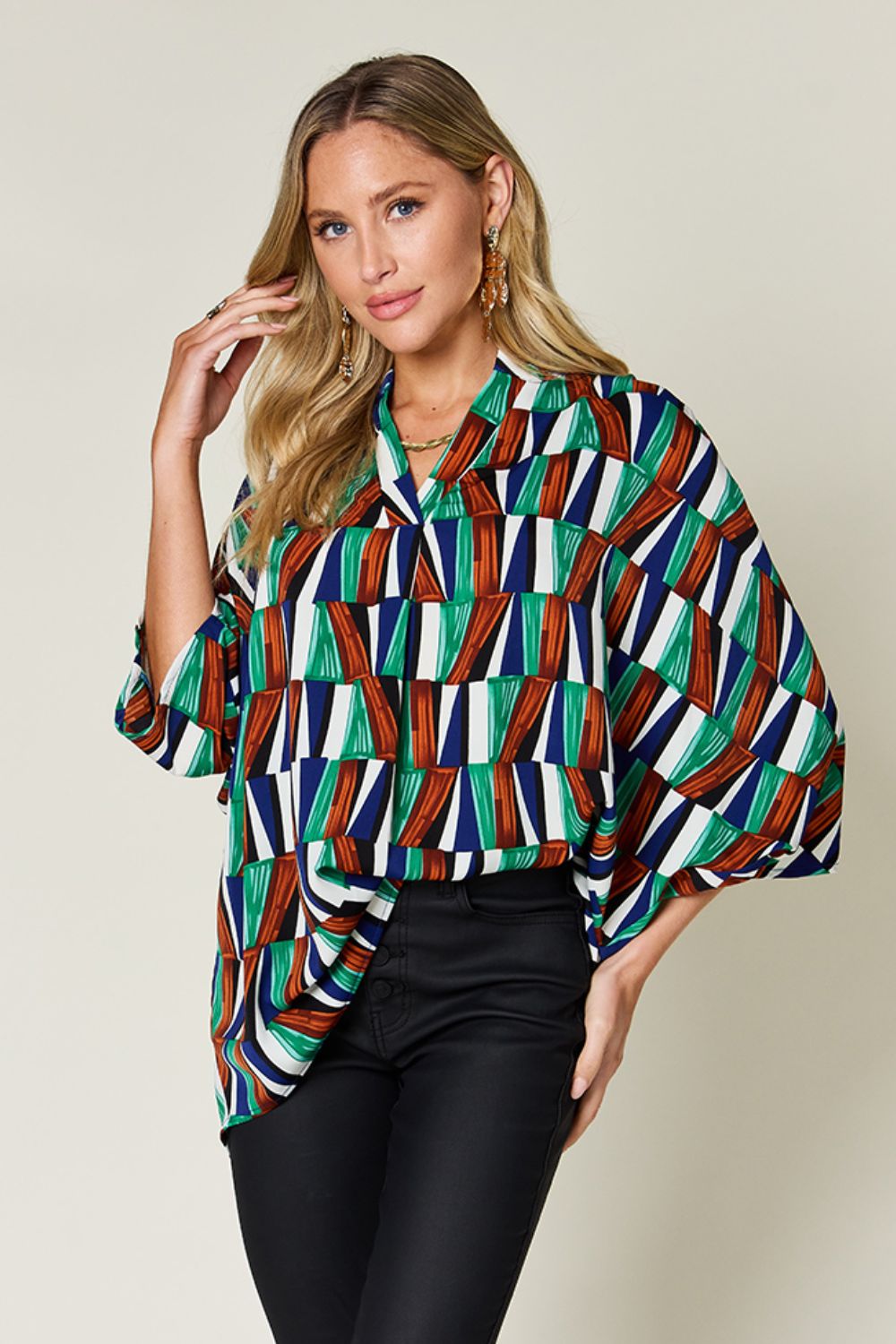 Double Take full size geometric notched dolman sleeve top.