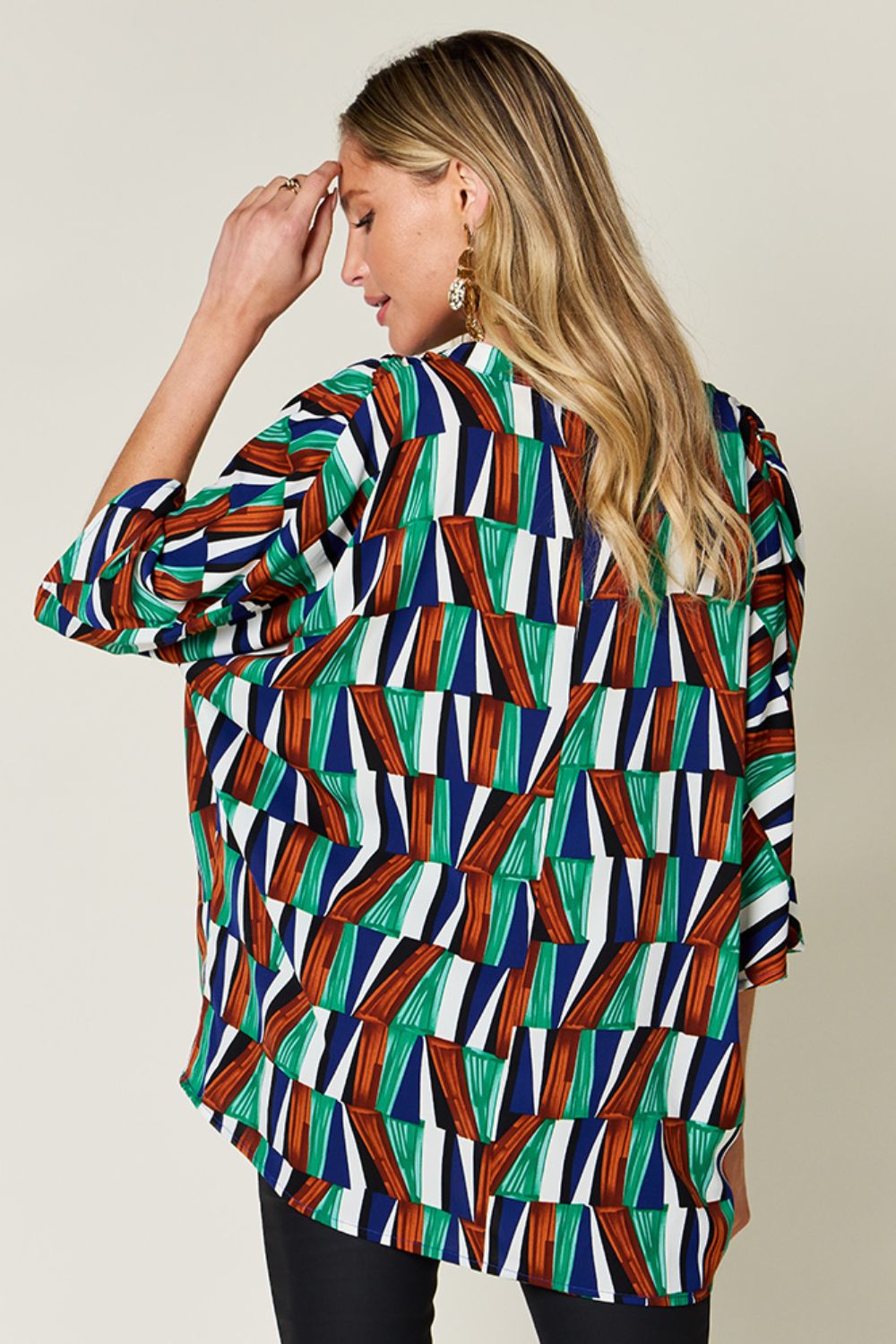 Double Take full size geometric notched dolman sleeve top.