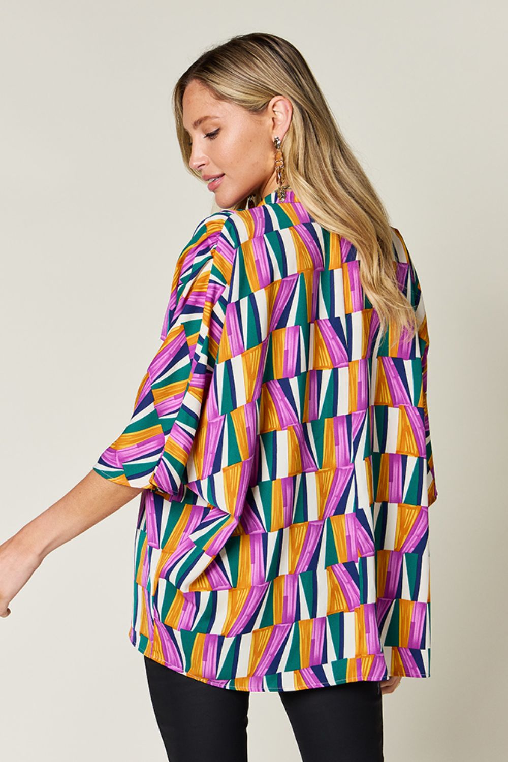Double Take full size geometric notched dolman sleeve top.