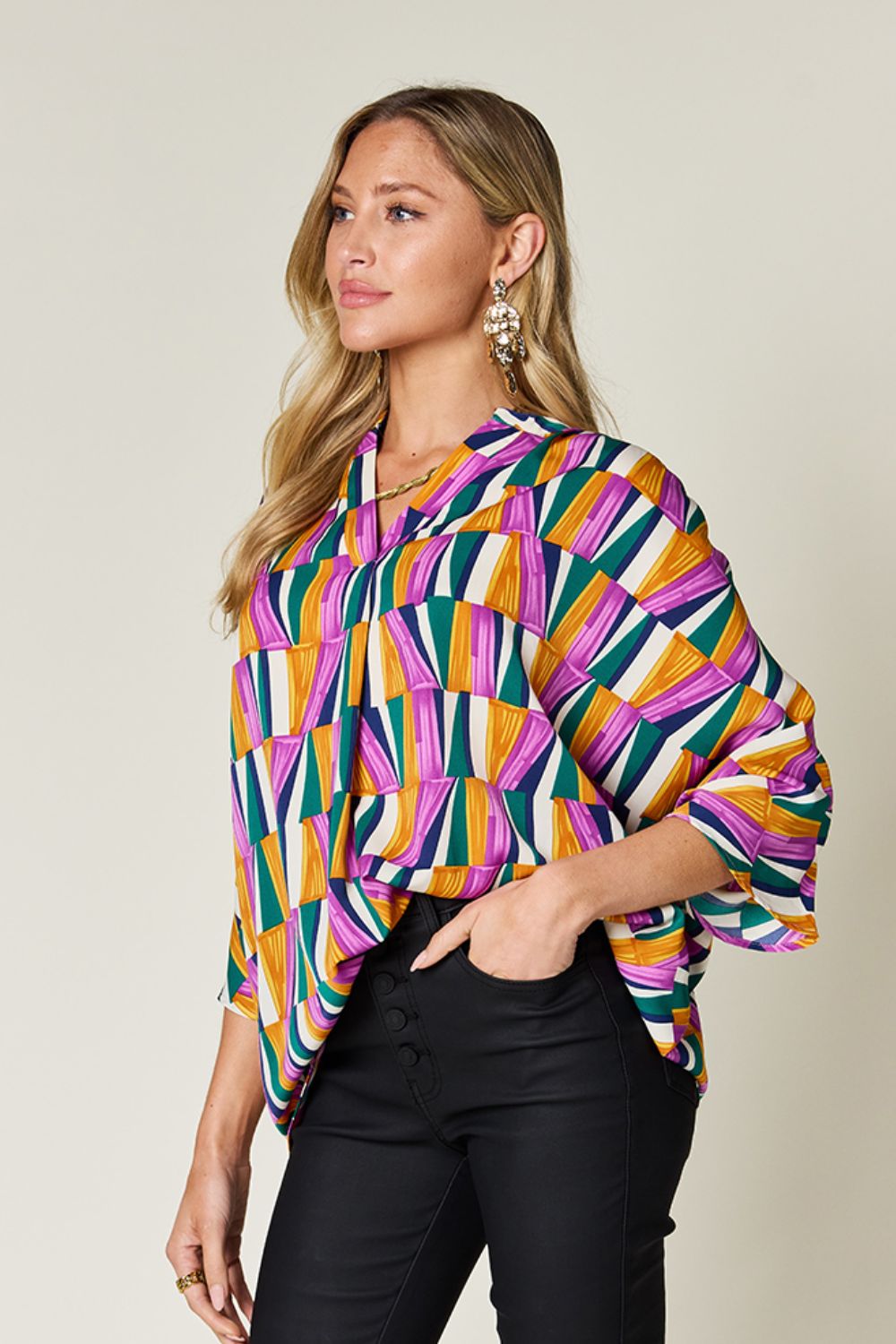 Double Take full size geometric notched dolman sleeve top.