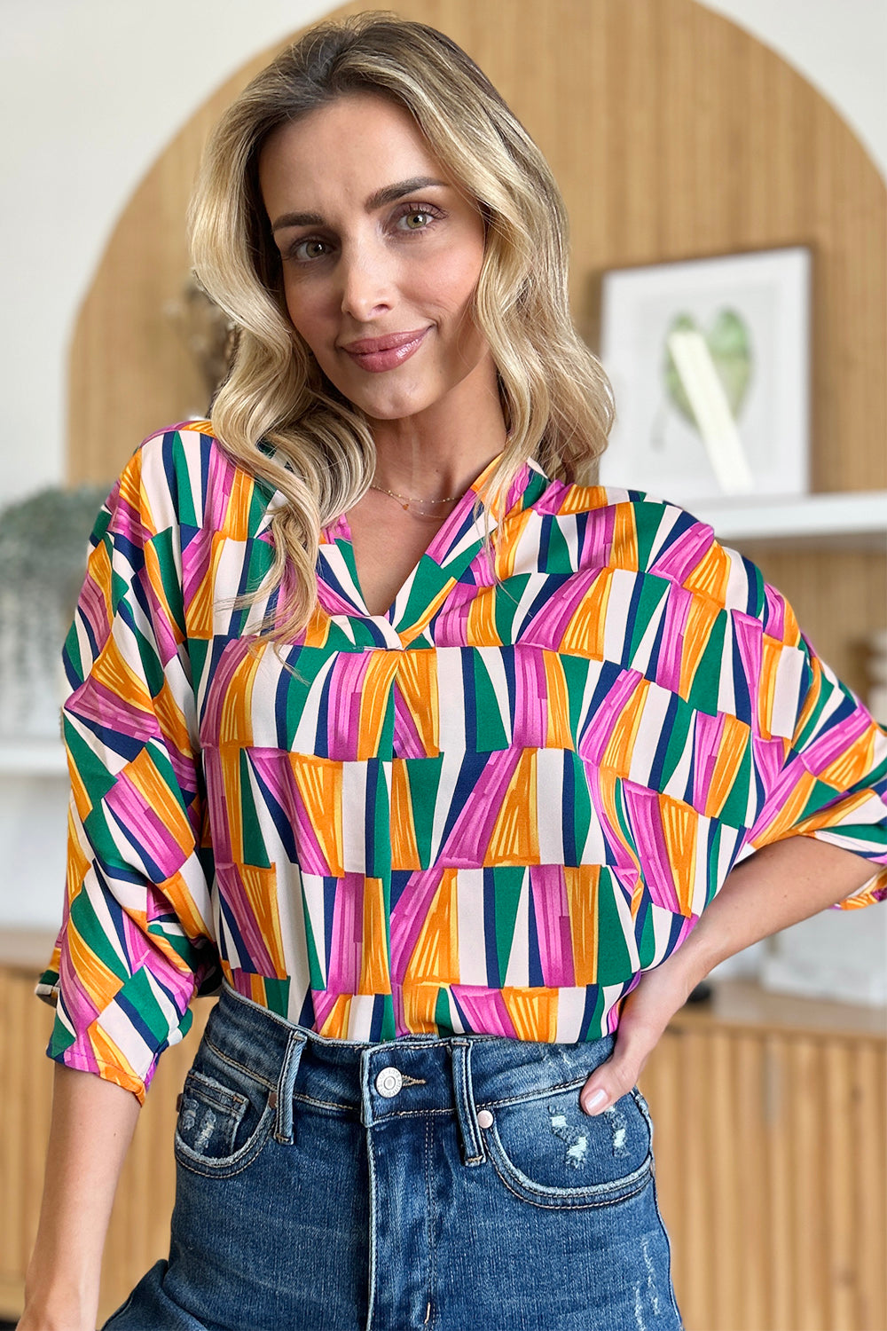 Double Take full size geometric notched dolman sleeve top.