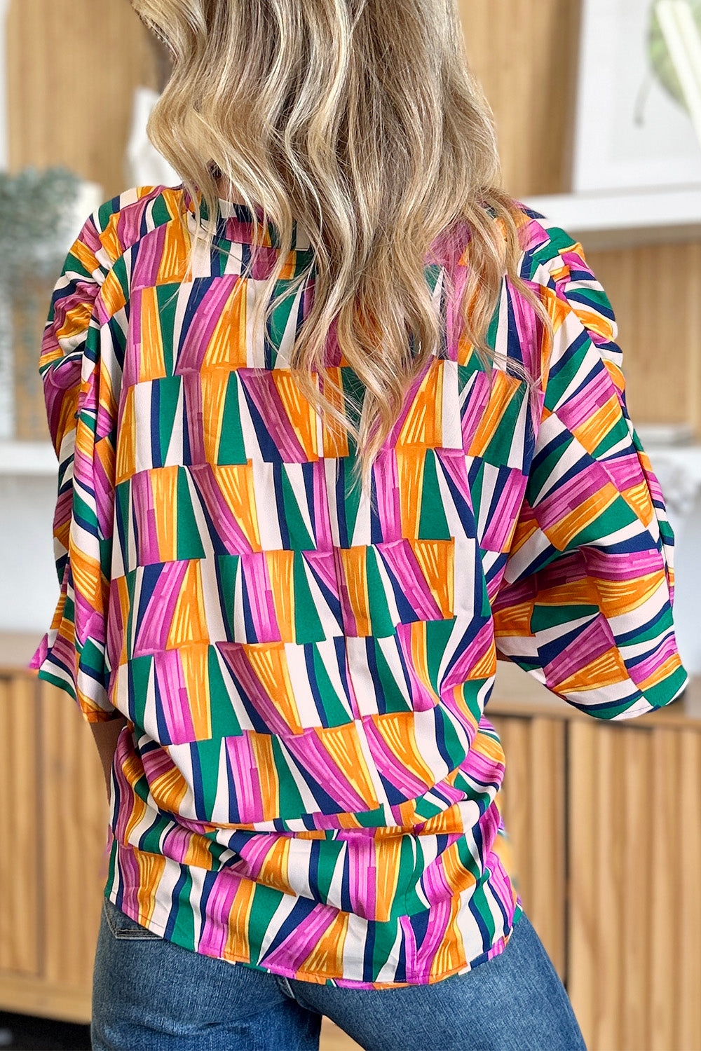 Double Take full size geometric notched dolman sleeve top.