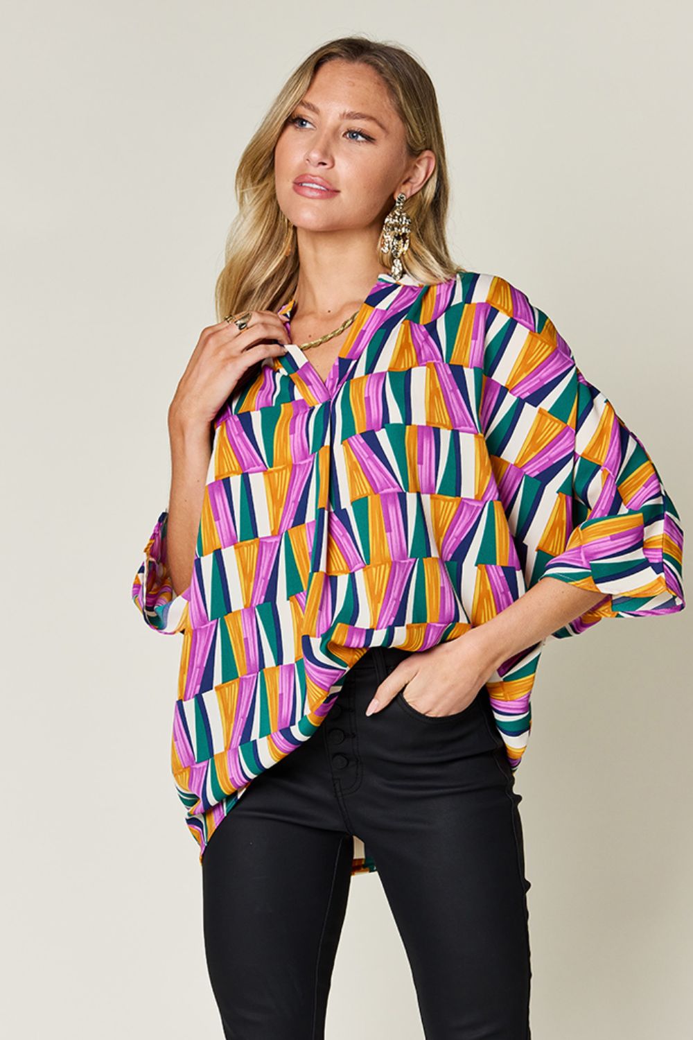 Double Take full size geometric notched dolman sleeve top.