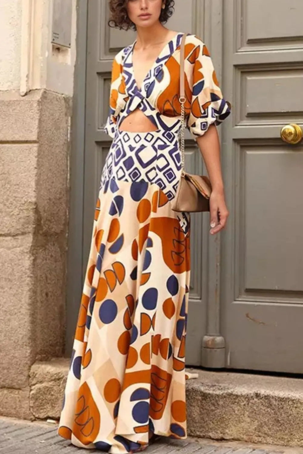 Geometric Print V-Neck Maxi Dress with Cutout Detail.