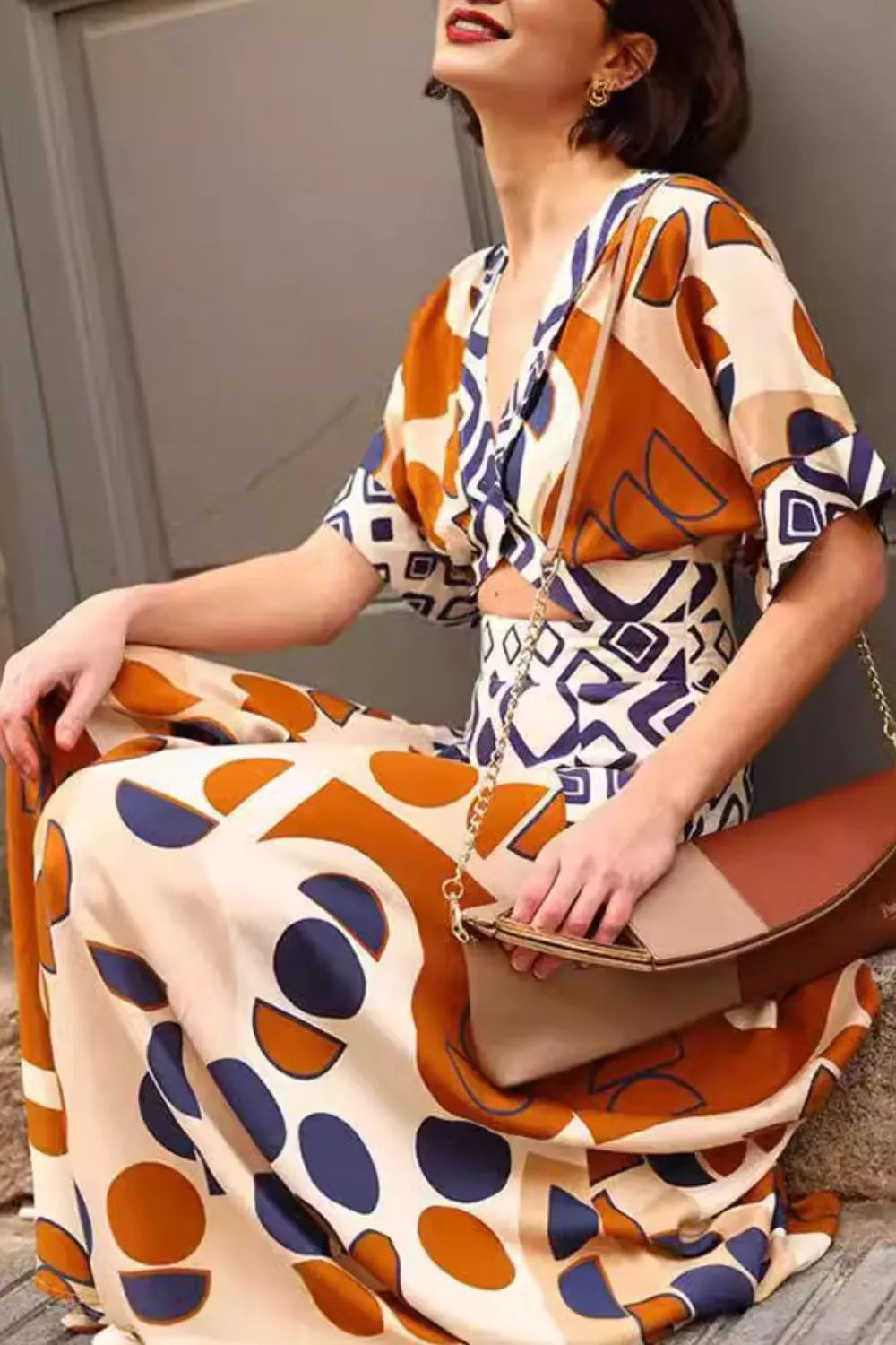 Geometric Print V-Neck Maxi Dress with Cutout Detail.