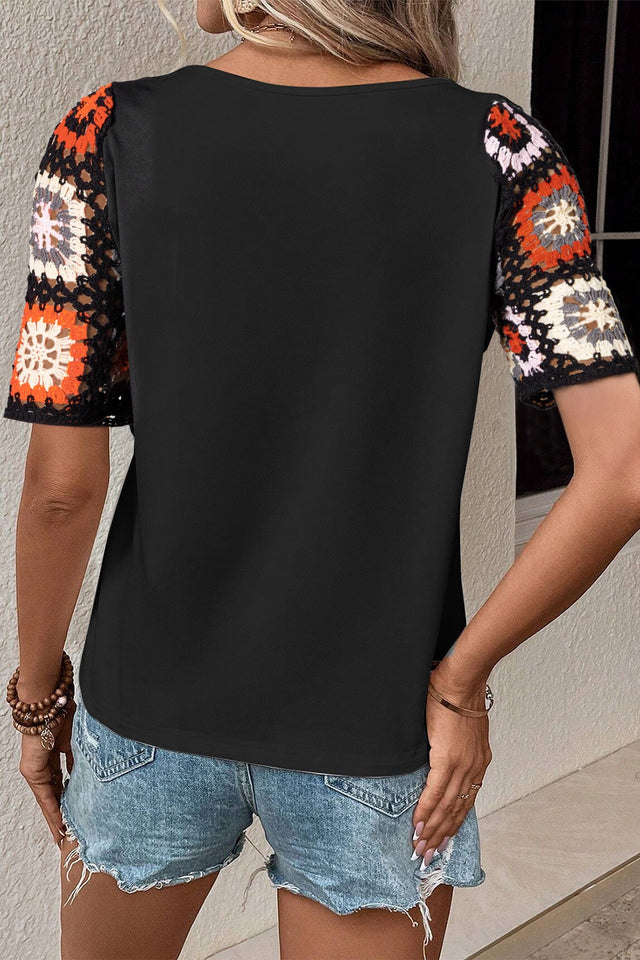 Geometric round neck short sleeve blouse.