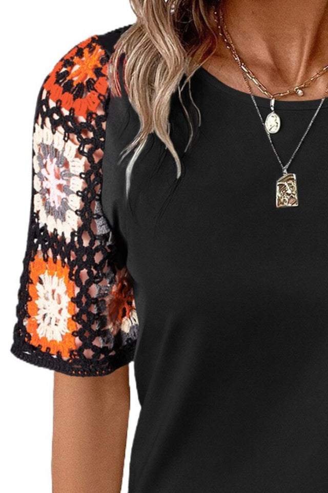 Geometric round neck short sleeve blouse.