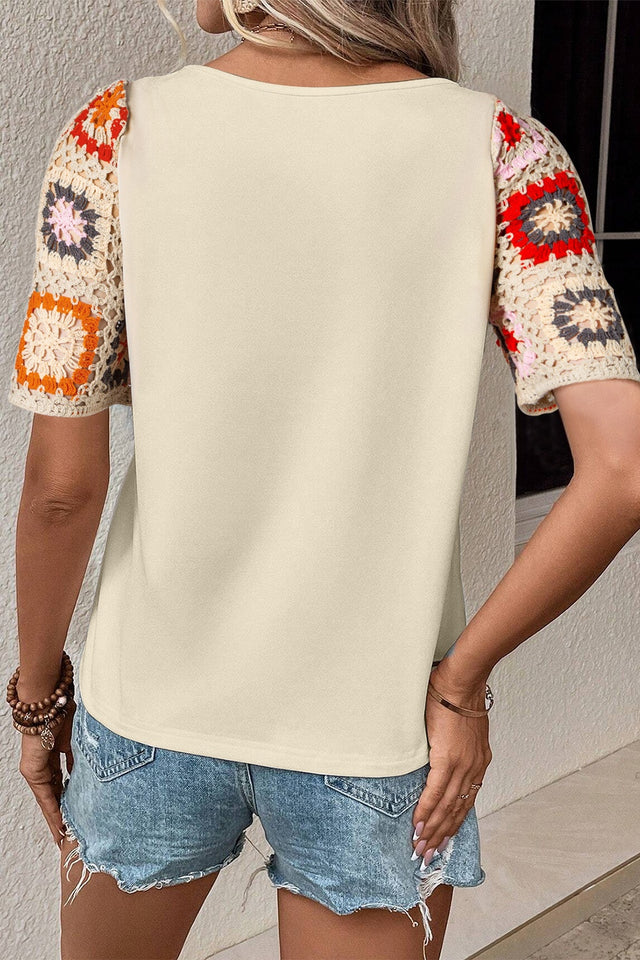 Geometric round neck short sleeve blouse.