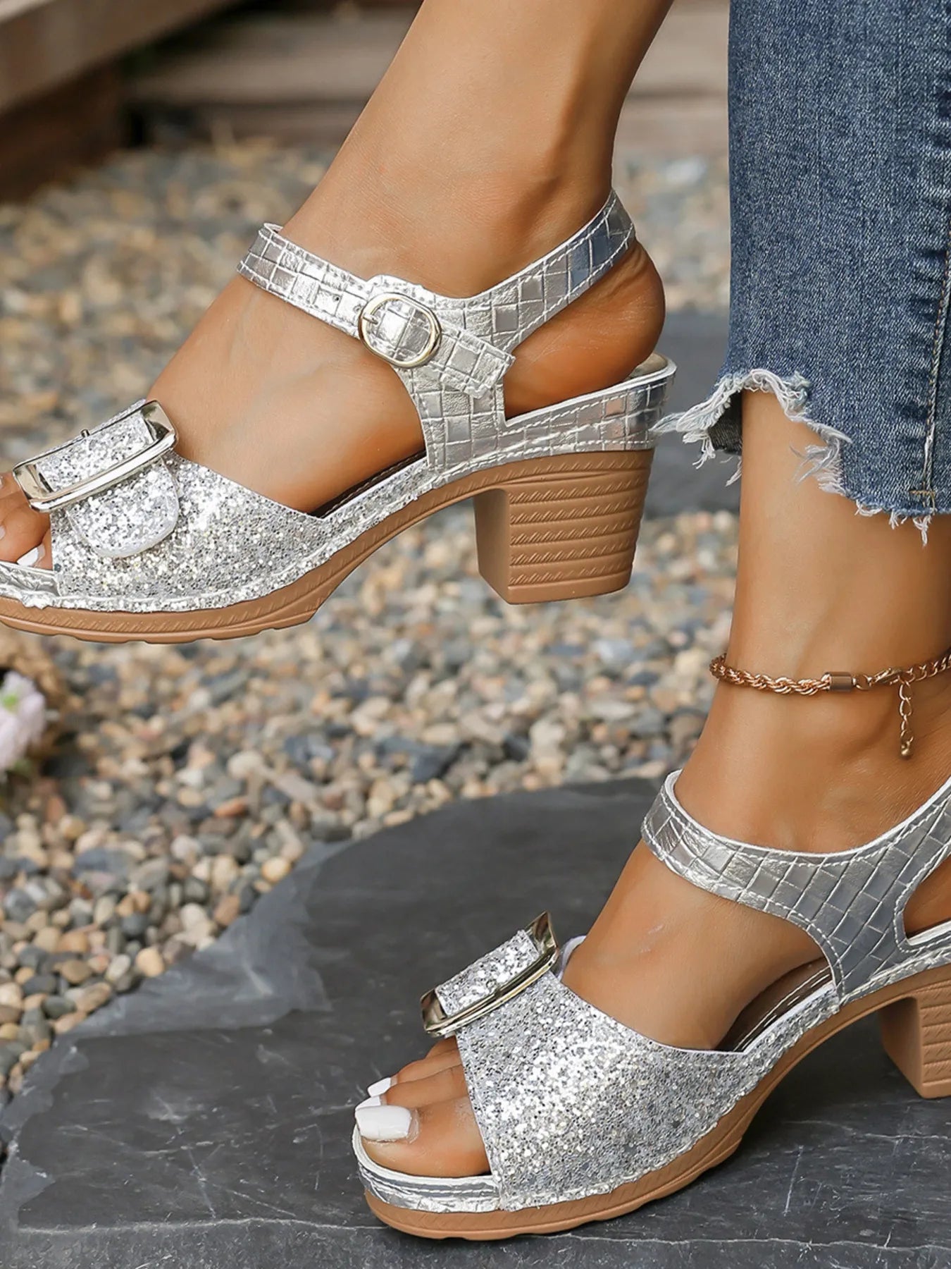 Glitter block heel buckle sandals with mid heels.