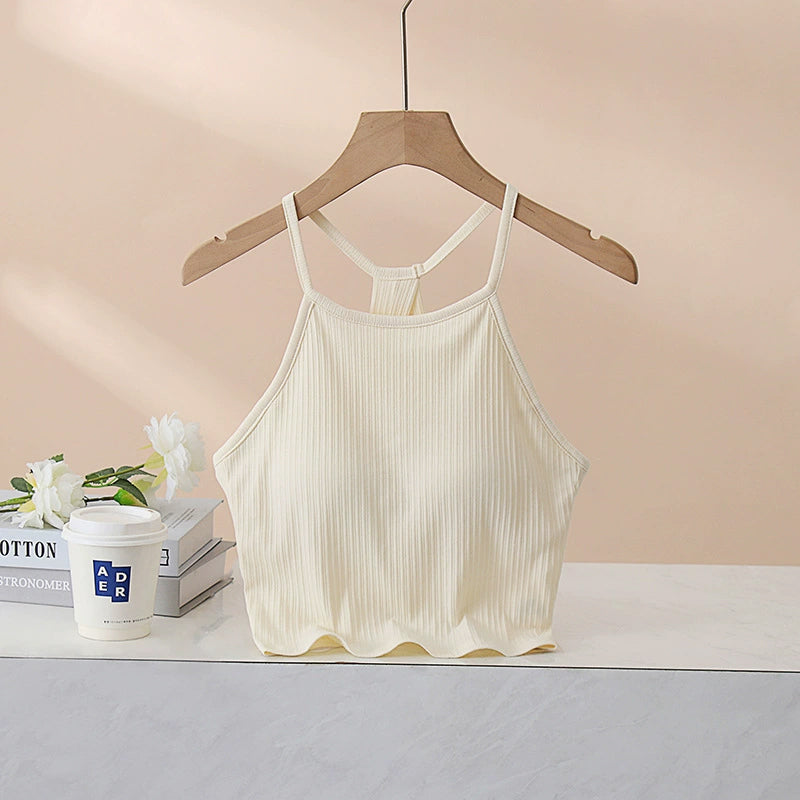 Grecian neck cropped tank top with chest pads.