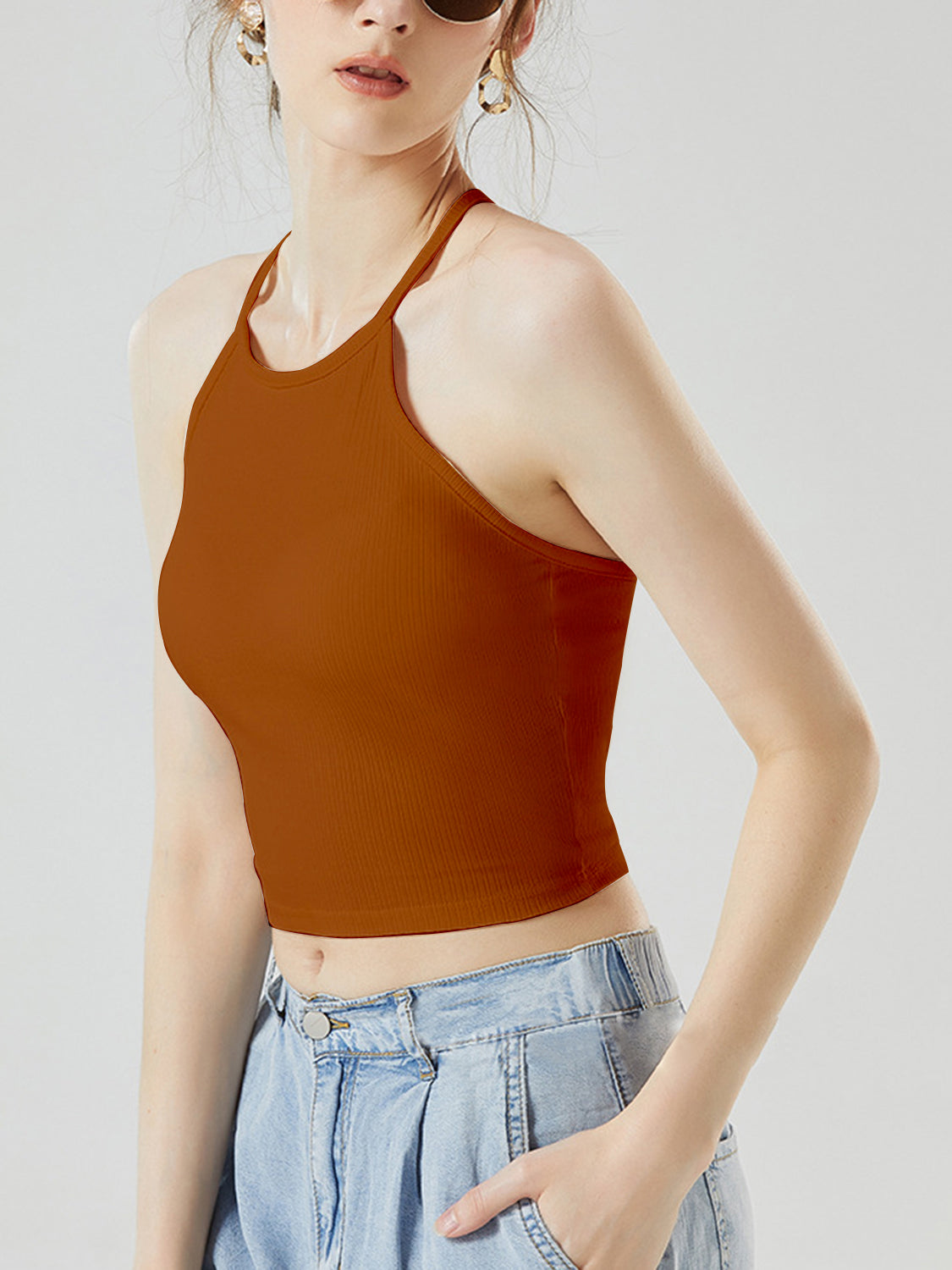 Grecian neck cropped tank top with chest pads.