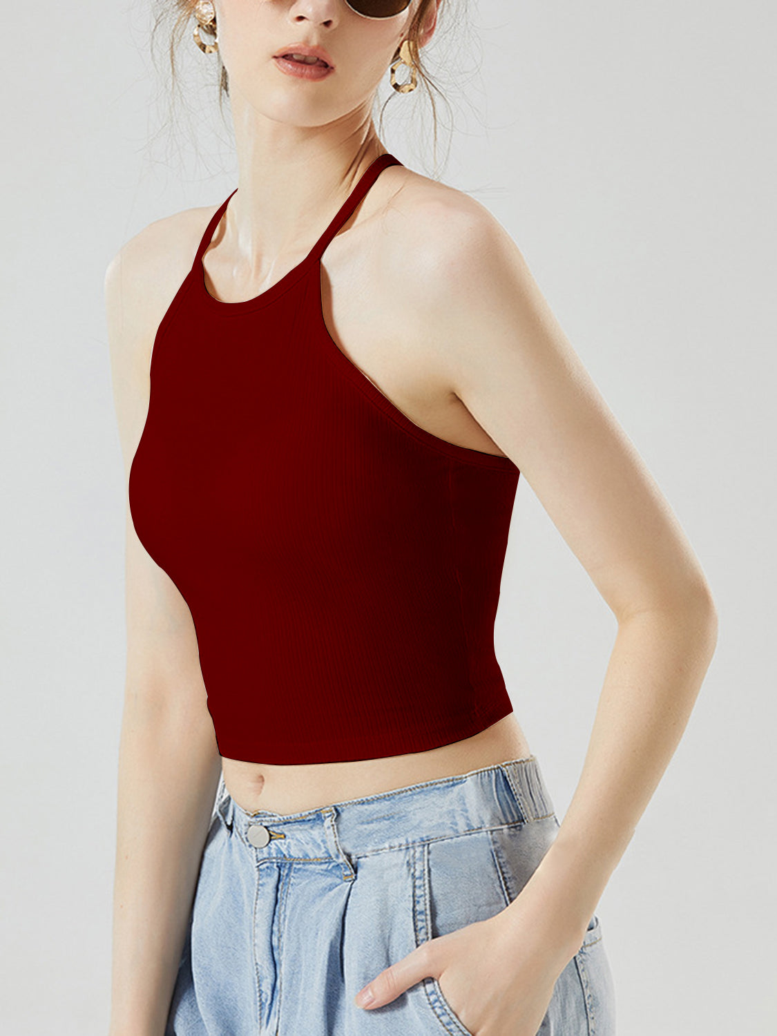 Grecian neck cropped tank top with chest pads.