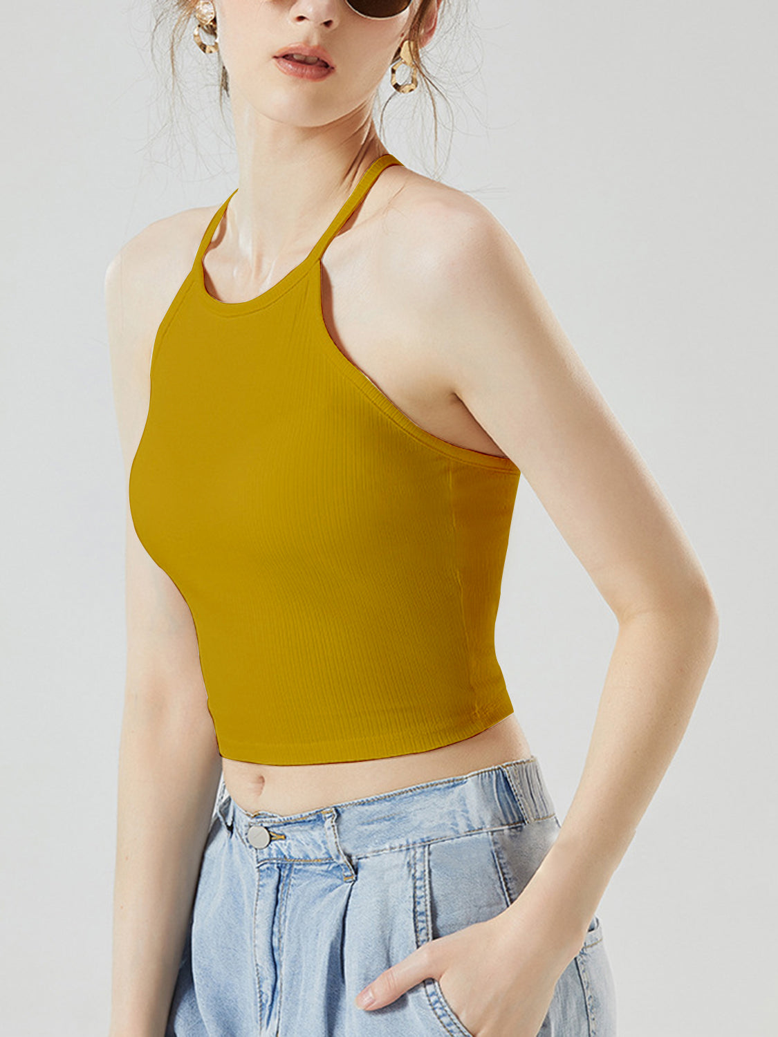 Grecian neck cropped tank top with chest pads.