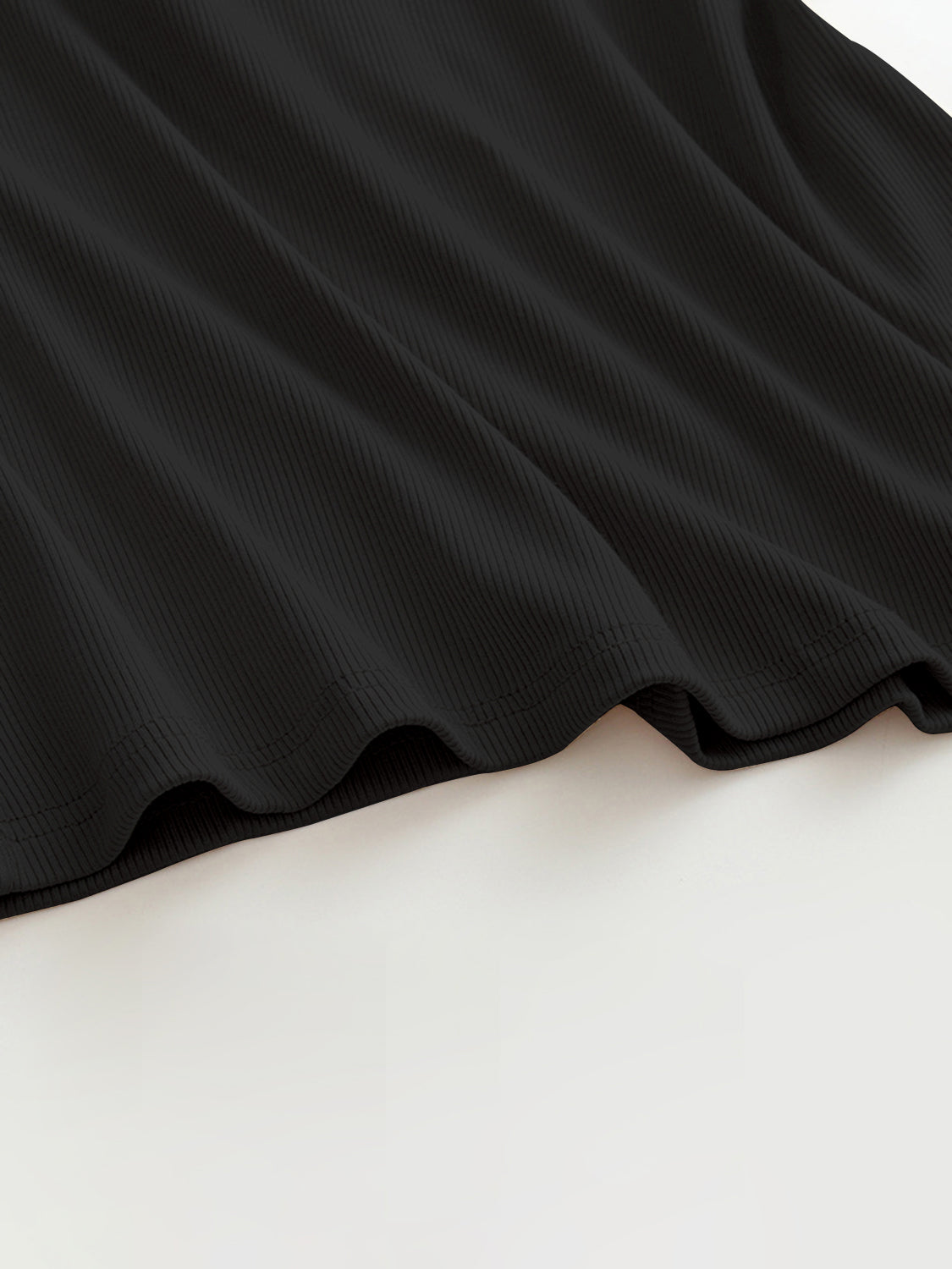 Grecian neck tank top with chest pads.
