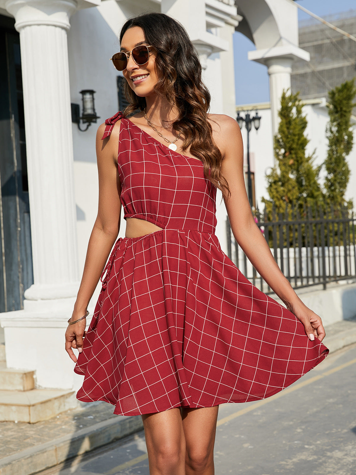 Grid One-Shoulder Tied Cutout Mini Dress.