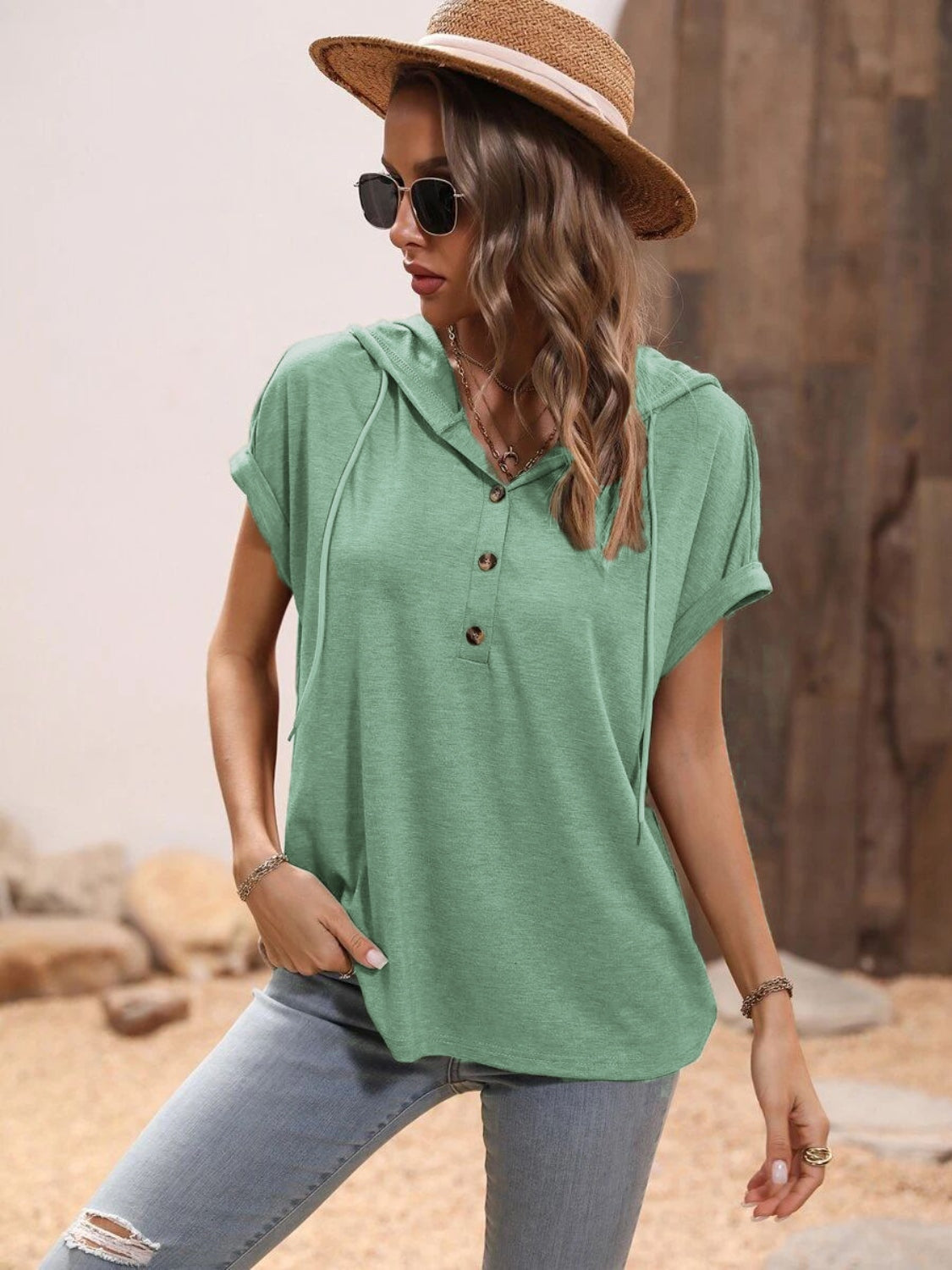 Half button hooded short sleeve blouse.
