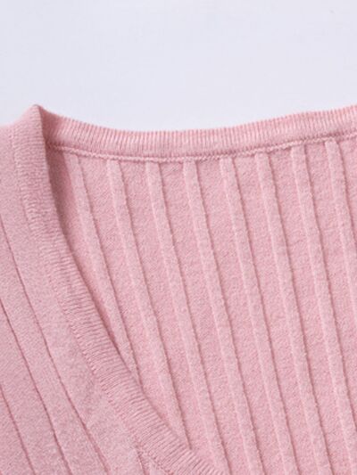 Half button scoop neck short sleeve knit top.