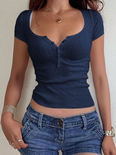 Half button scoop neck short sleeve knit top.