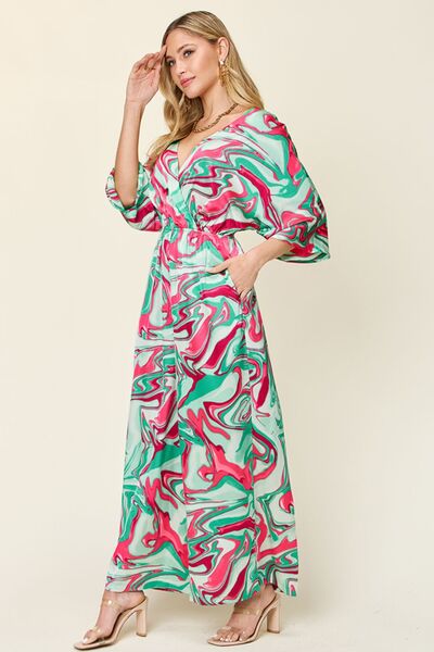 Half Sleeve Wide Leg Jumpsuit with Tie and Ruched Details.