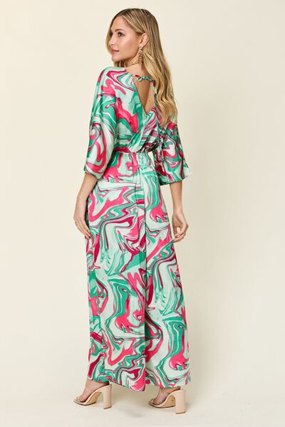 Half Sleeve Wide Leg Jumpsuit with Tie and Ruched Details.