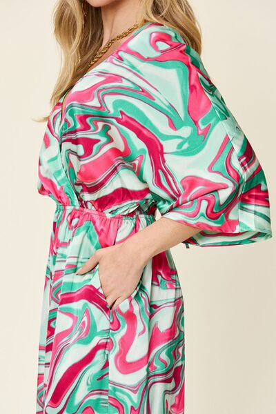 Half Sleeve Wide Leg Jumpsuit with Tie and Ruched Details.