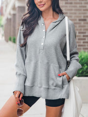 Half snap long sleeve hoodie with pockets.