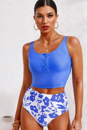 Solid/striped/leopard/floral print half snap scoop neck tankini set with high-waist bottom and no padding.