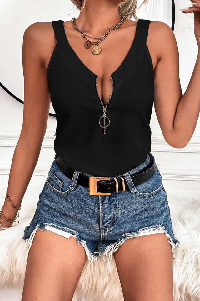 Half-zip scoop neck tank top.