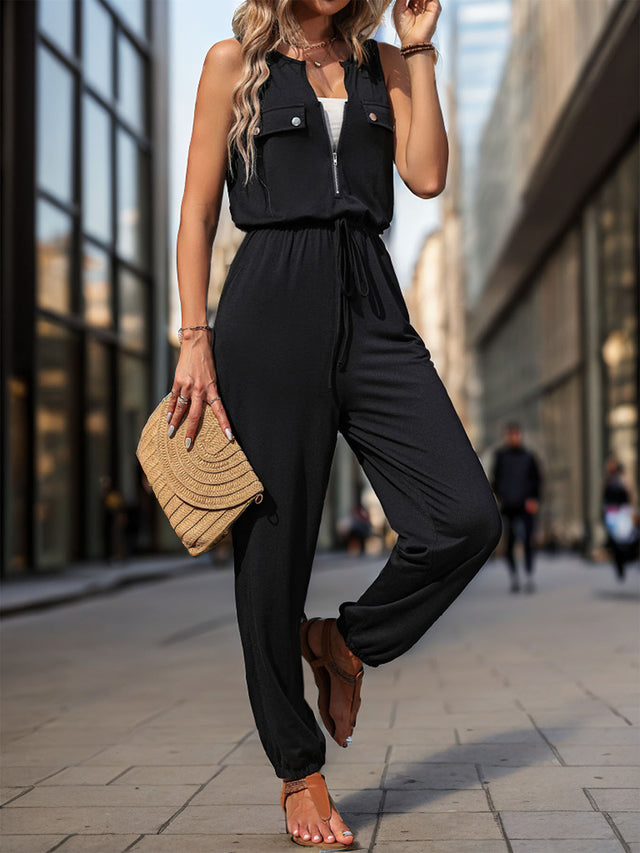 Half Zip Sleeveless Jumpsuit with Pockets and Tie.