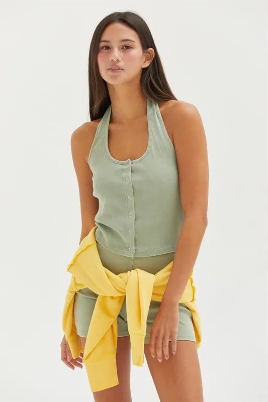 Halter neck buttoned washed top with ribbed texture, moderately stretchy.